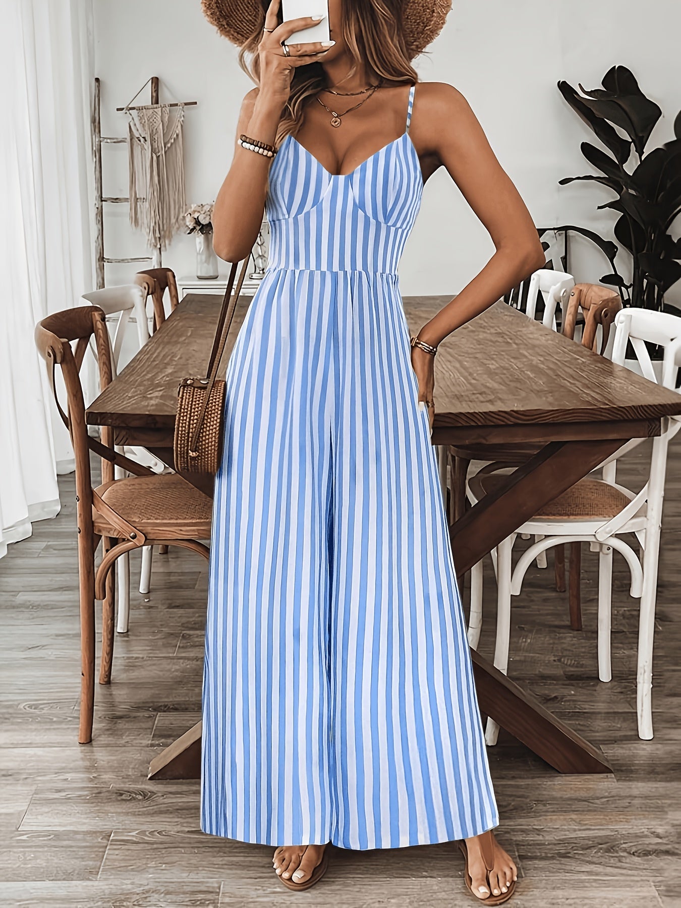 Damen gestreifter weiter Jumpsuit mit V Ausschnitt und Schleife hinten